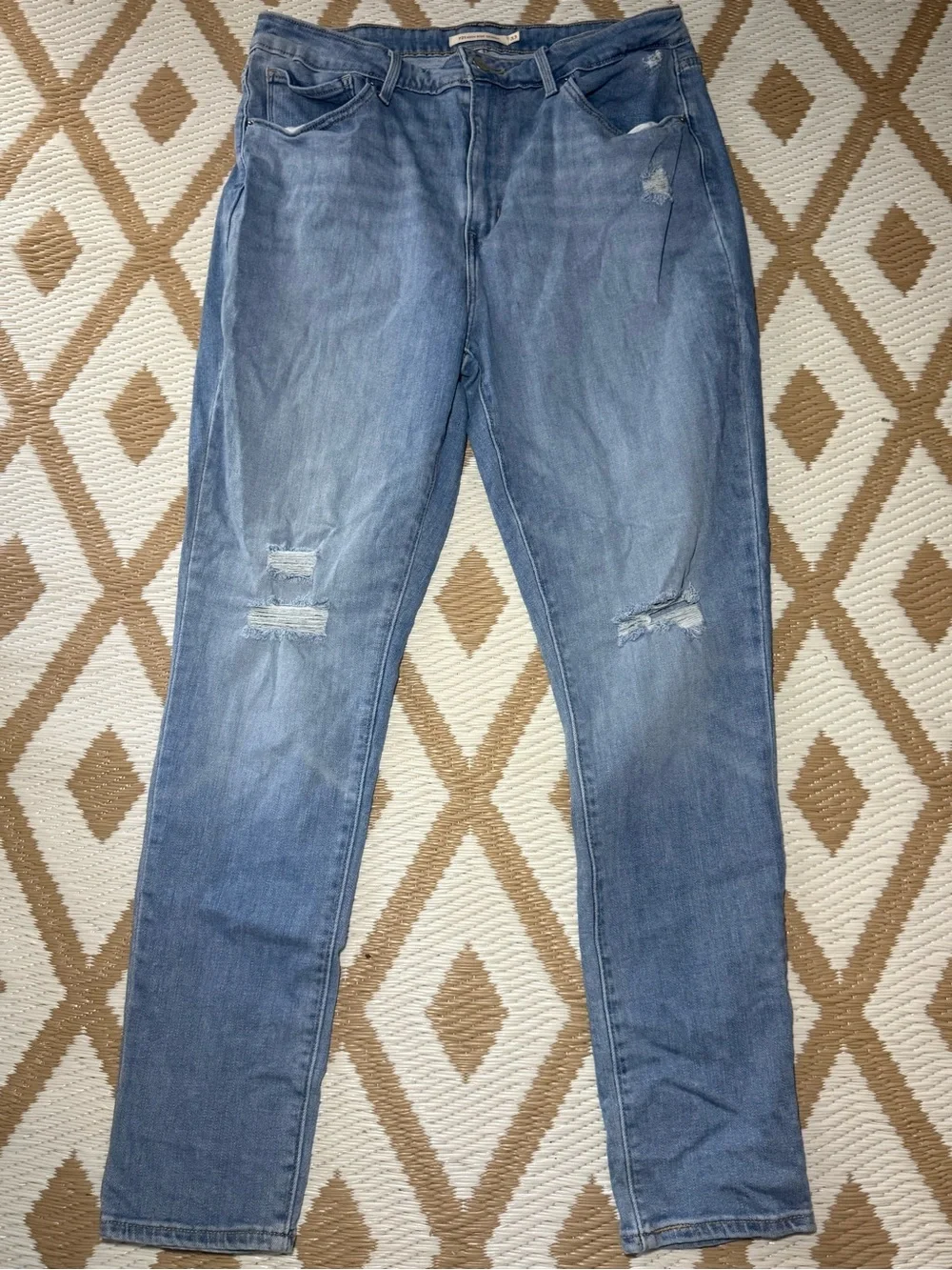 Levi's men's Blue Light Wash High Rise Skinny Fit Distressed 5-Pocket 33